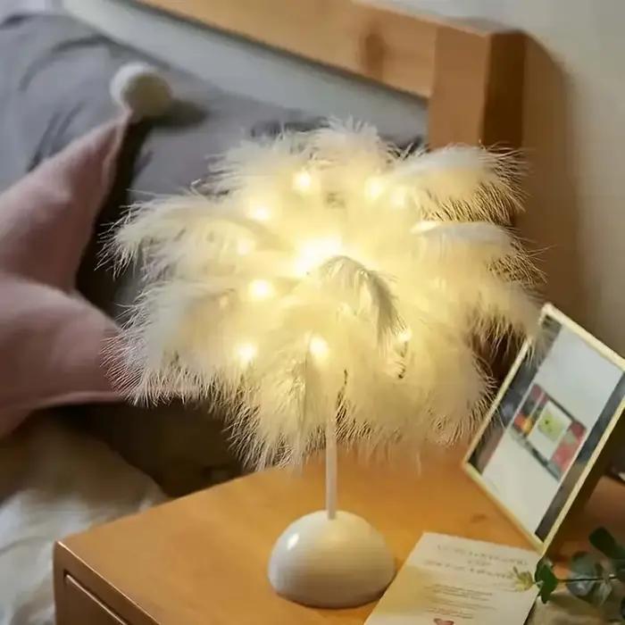 Lampe de table LED au design plume pour enfants, alimentée par batterie, portable et idéale pour une