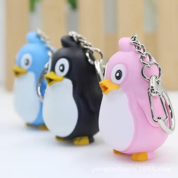 Mignon Animal pingouin lumière LED avec son porte-clés porte-clés torche cadeau de noël porte-clés porte-clés porte-clés