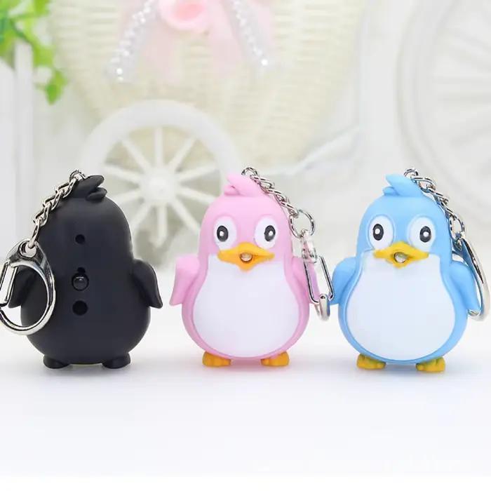 Mignon Animal pingouin lumière LED avec son porte-clés porte-clés torche cadeau de noël porte-clés porte-clés porte-clés